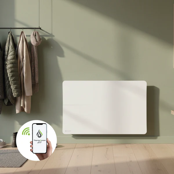 Installation dans un hall d'entrée d'un radiateur électrique connecté 2000W Cira double système de chauffe horizontal TC-CI2000H-W blanc de Thermoceram.